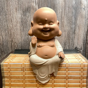 Laughing Buddha - No Fear Hand Gesture